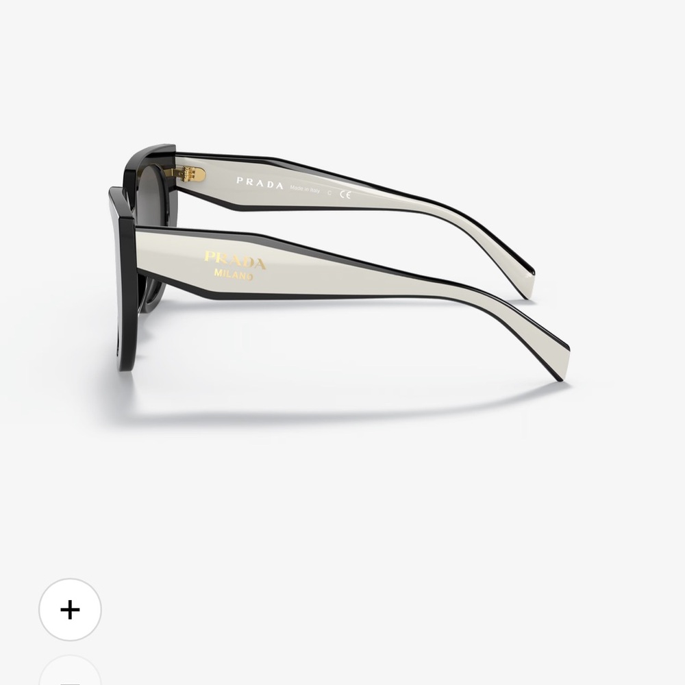 Prada Elegant Black and Cream Sunglasses- used. Condition: good